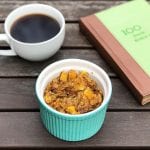 bowl of gluten free baked pumpkin spice oatmeal with cup of coffee