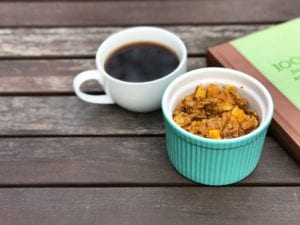Bowl of Gluten Free Pumpkin Spice Baked Oatmeal with Coffee