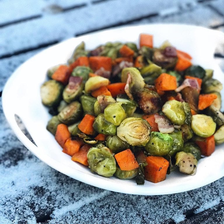 plate of honey roasted Brussels sprouts with sweet potatoes and bacon